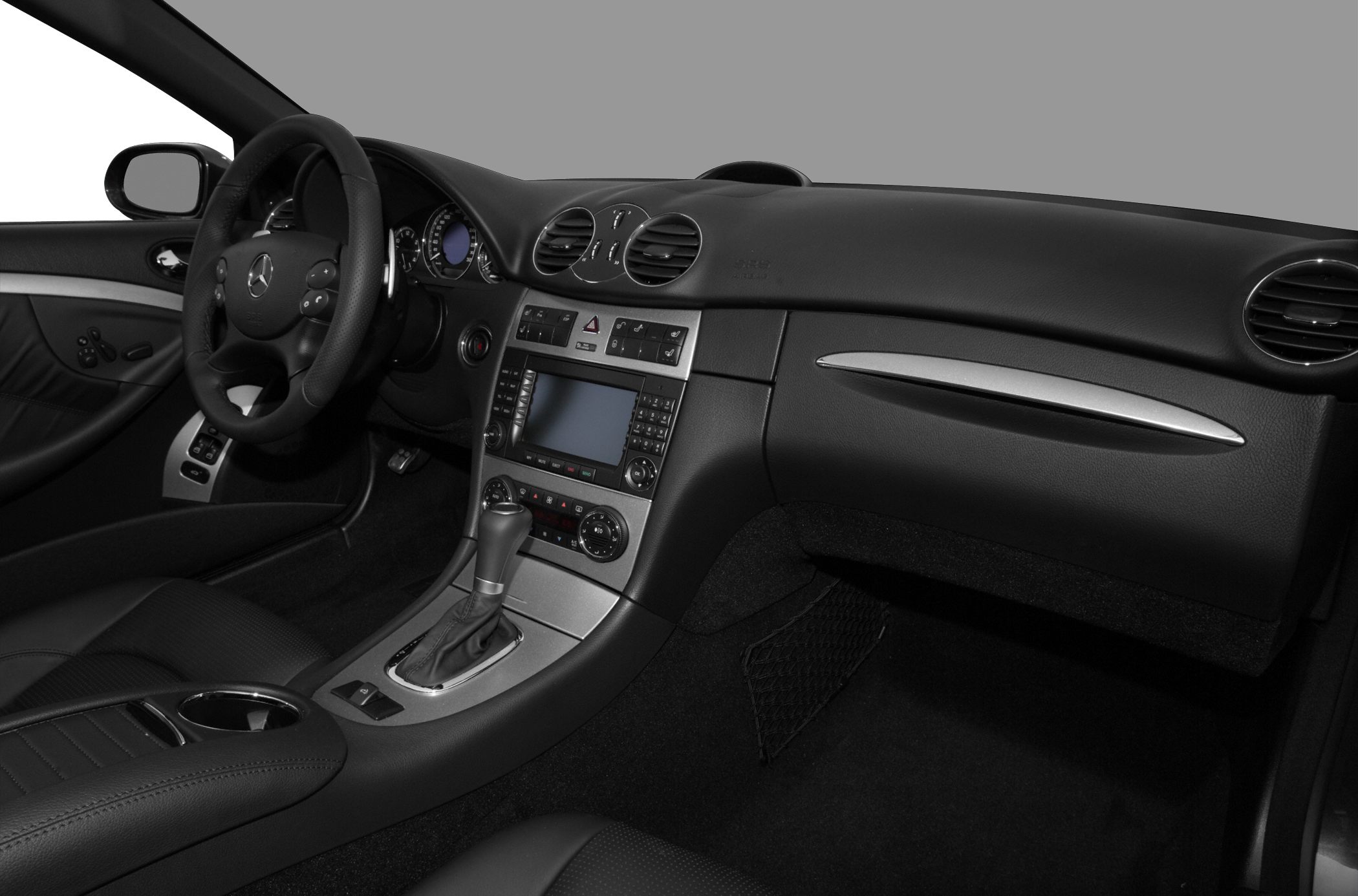Interior dashboard and steering wheel with center console and gear shift