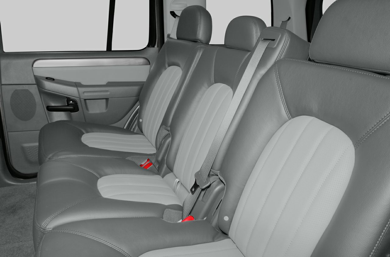 Rear leather seats and seat belts in SUV interior