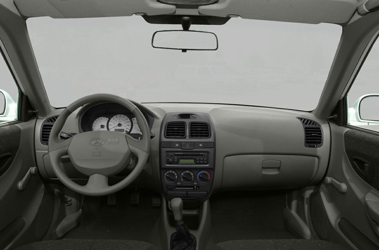Classic car interior dashboard and manual transmission setup
