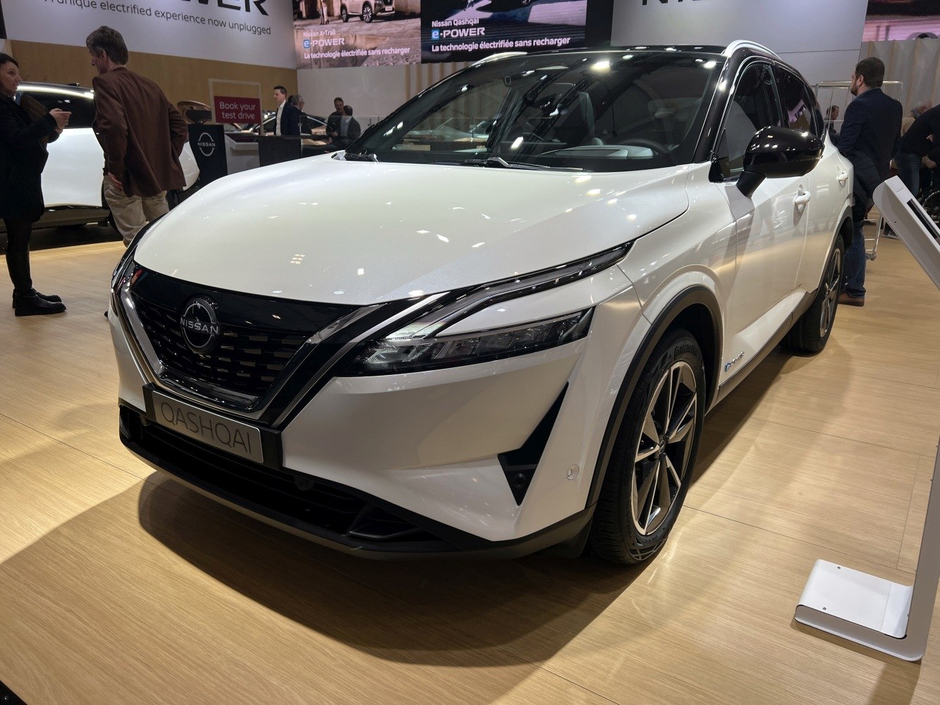 Sharp LED headlights and distinctive front grille of modern crossover