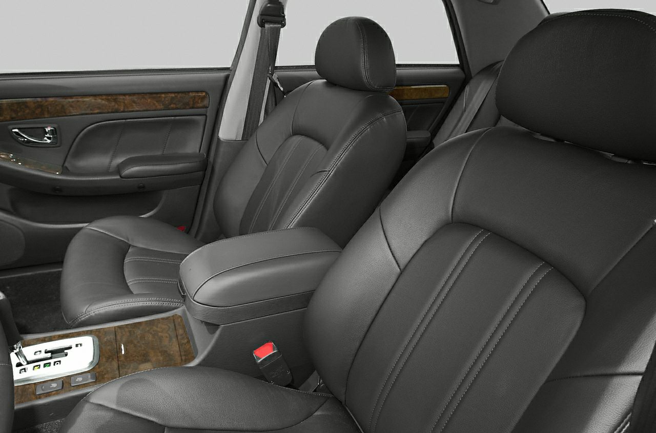 Leather front seats with wood trim and center armrest