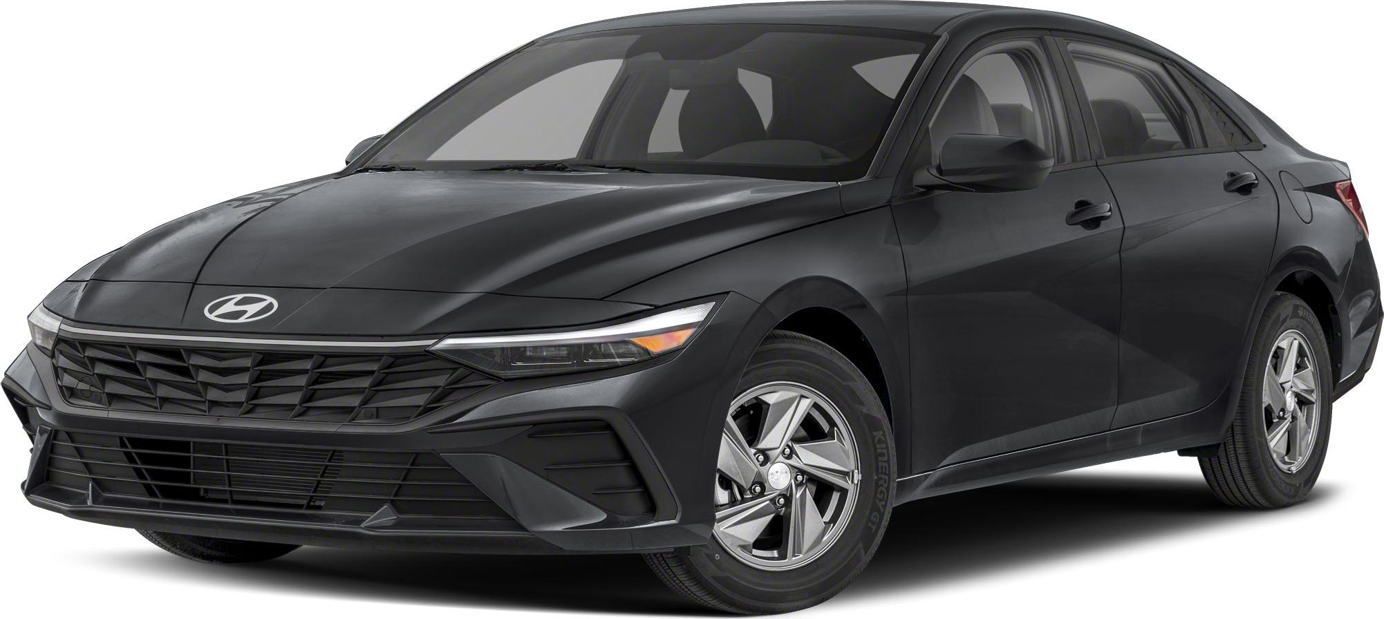 Front view of sleek headlights and modern grille design on black sedan