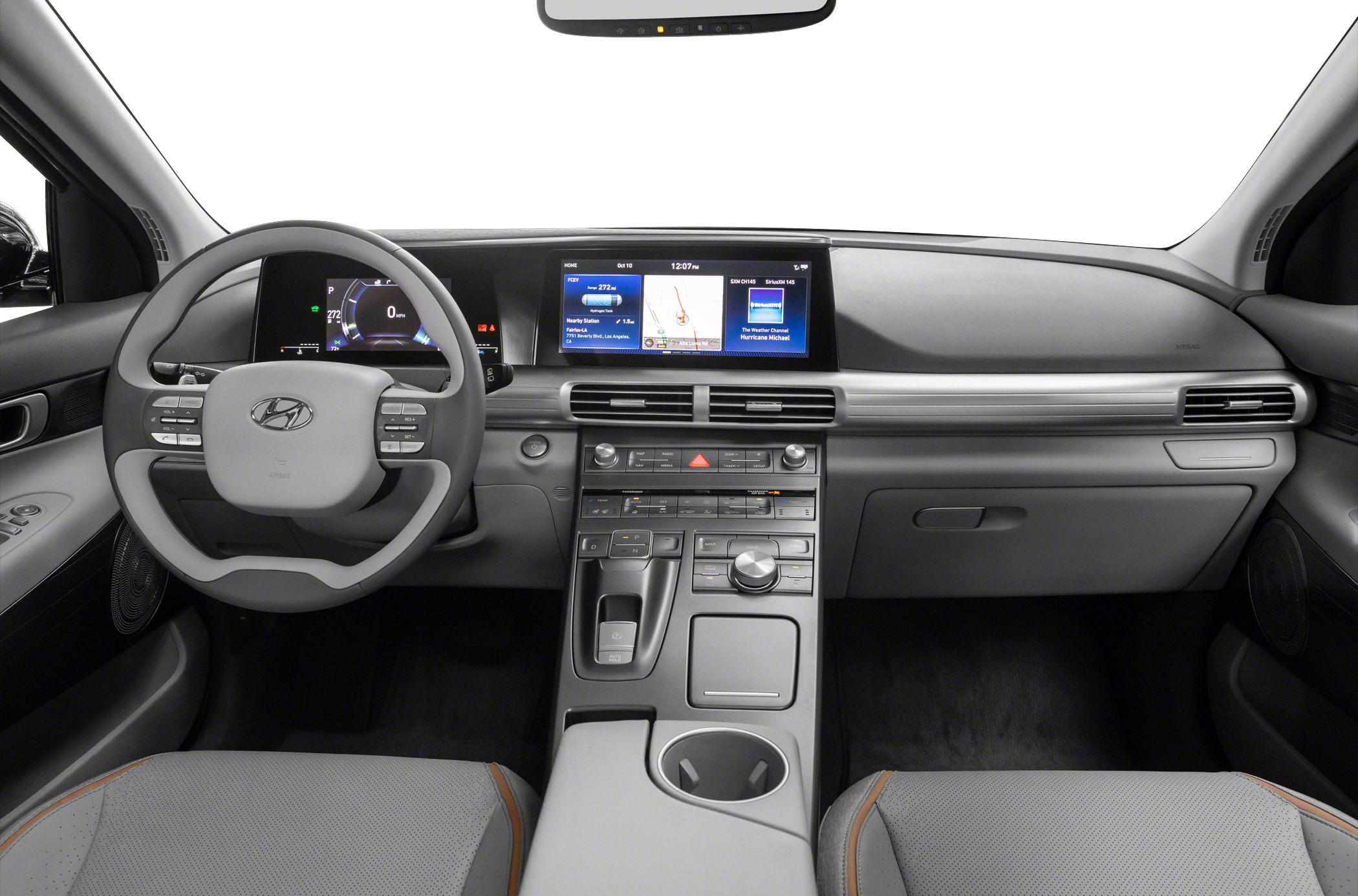 Digital dashboard and center console with control buttons and cup holder