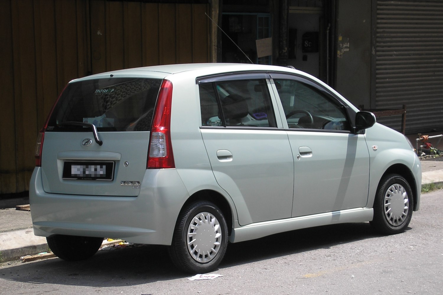 Compact hatchback with vertical taillights and smooth, simple body design