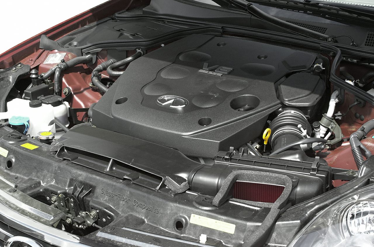 V8 engine under the hood with detailed automotive components.