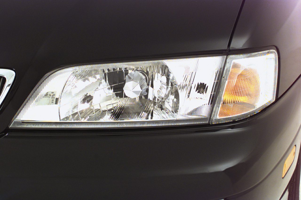 Close-up of clear lens headlight with amber indicator