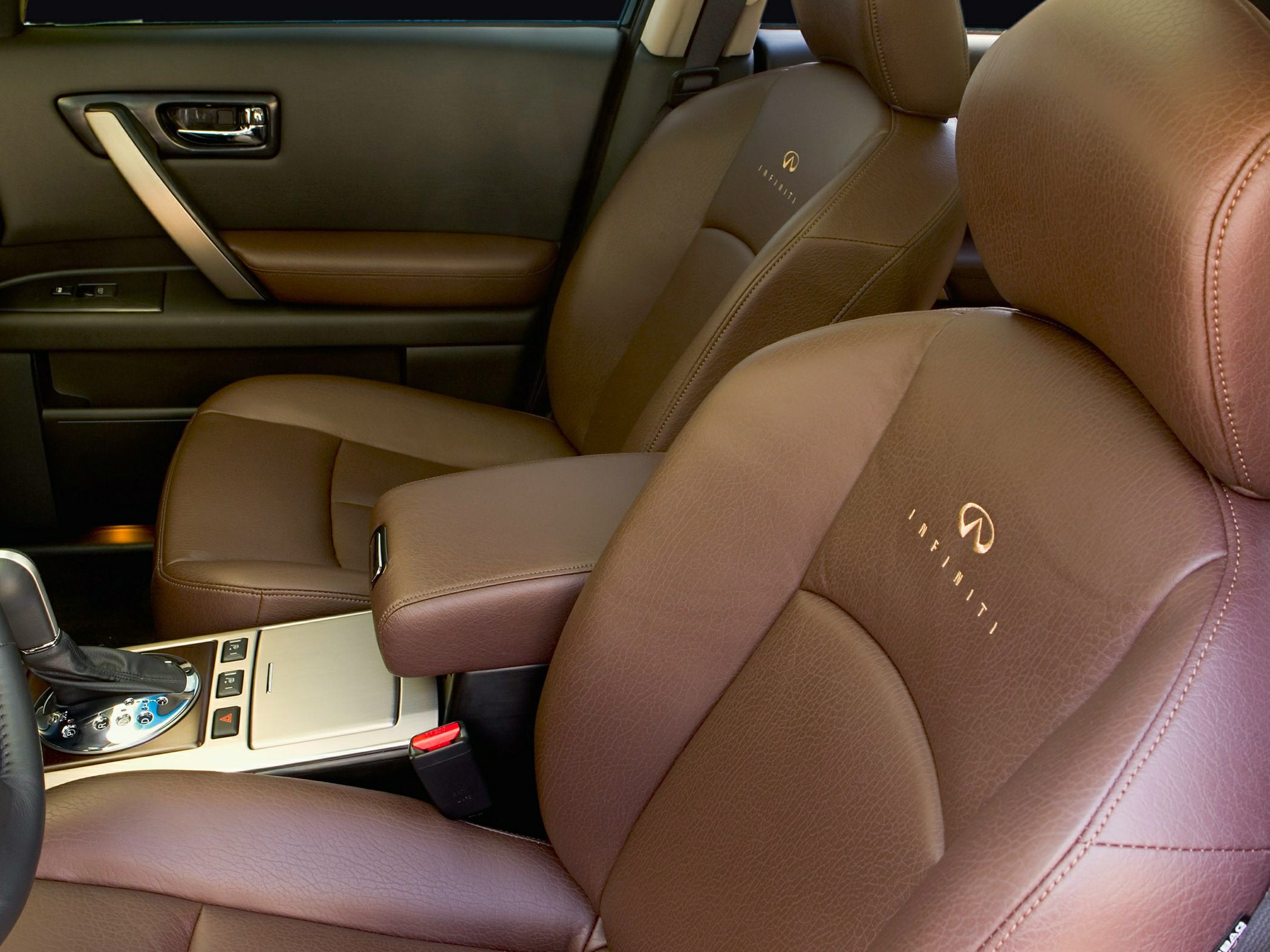 Brown leather seats and center console with gear shift