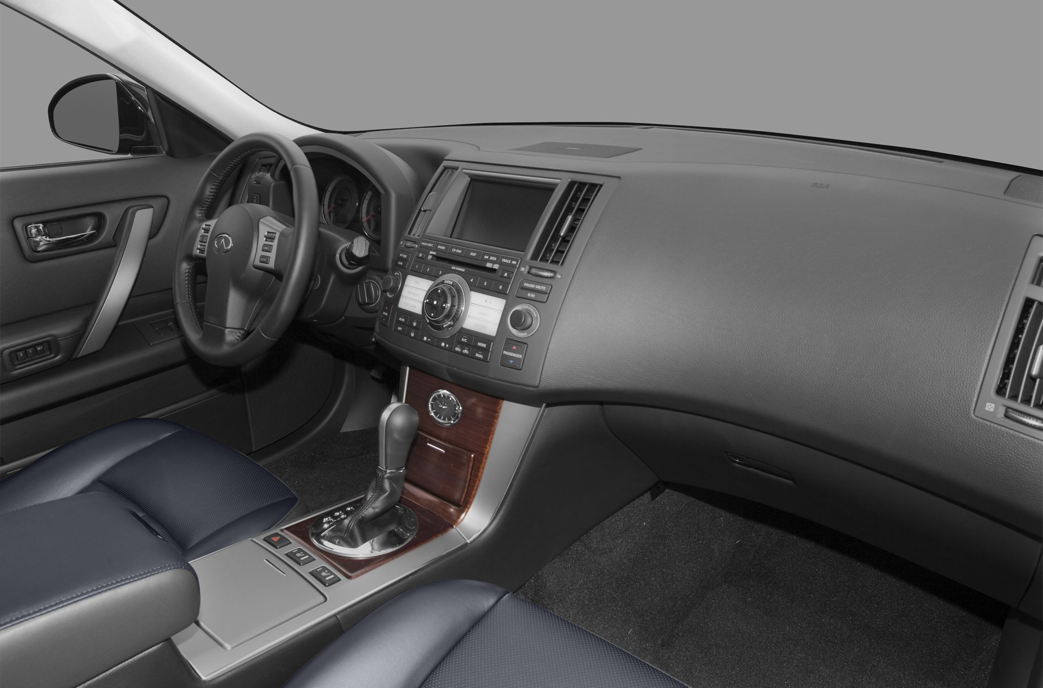 Car interior with dashboard, center console, and steering wheel