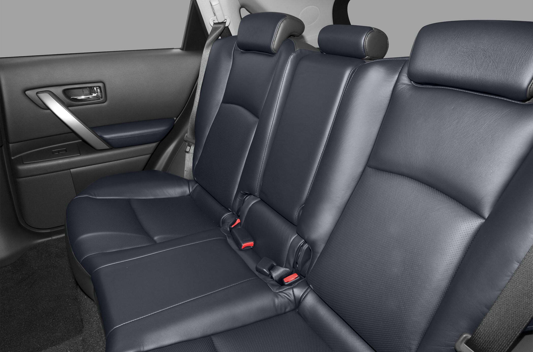 Rear leather seats with headrests and seatbelt in car interior