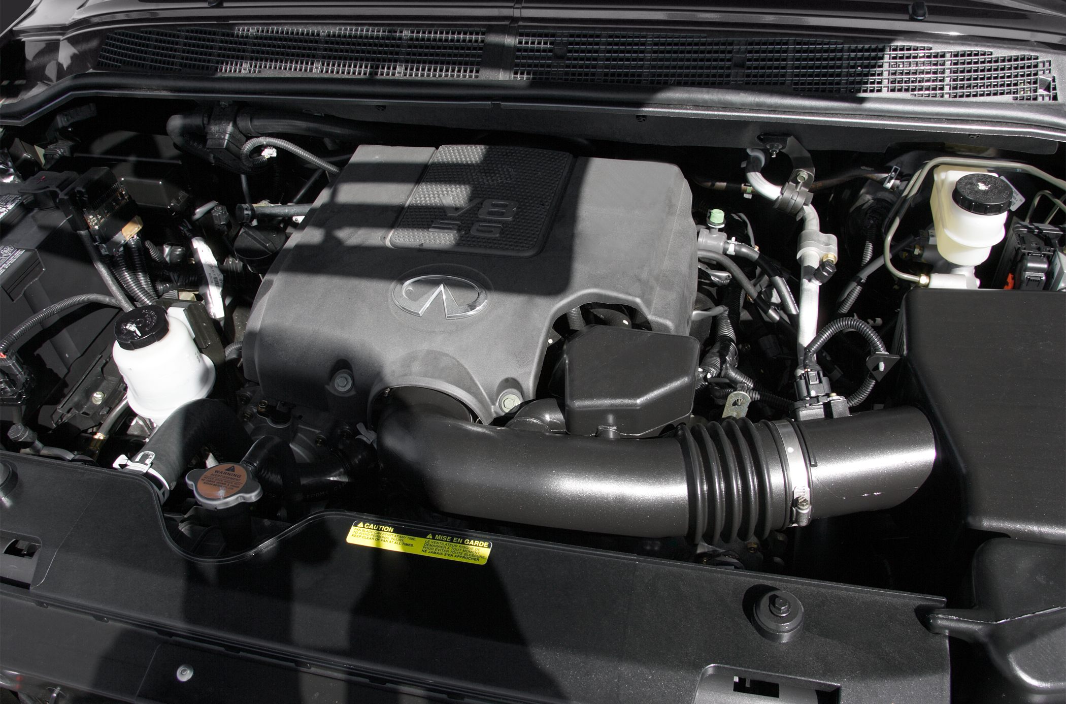 Close-up view of V8 engine cover and air intake system
