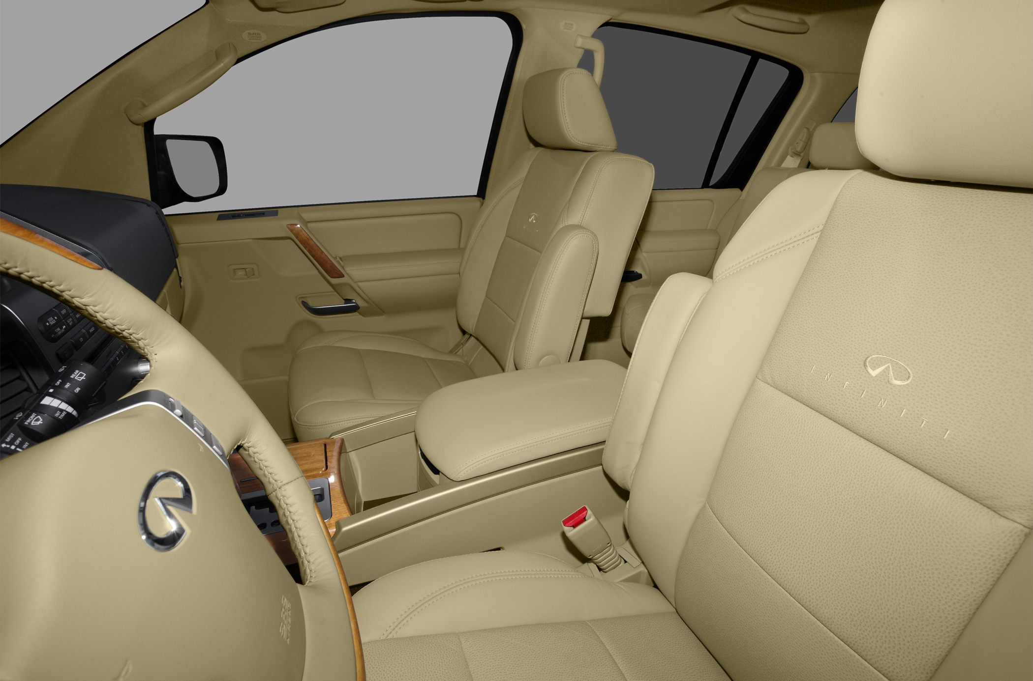 Beige leather seats with Infiniti embroidery and wood trim interior