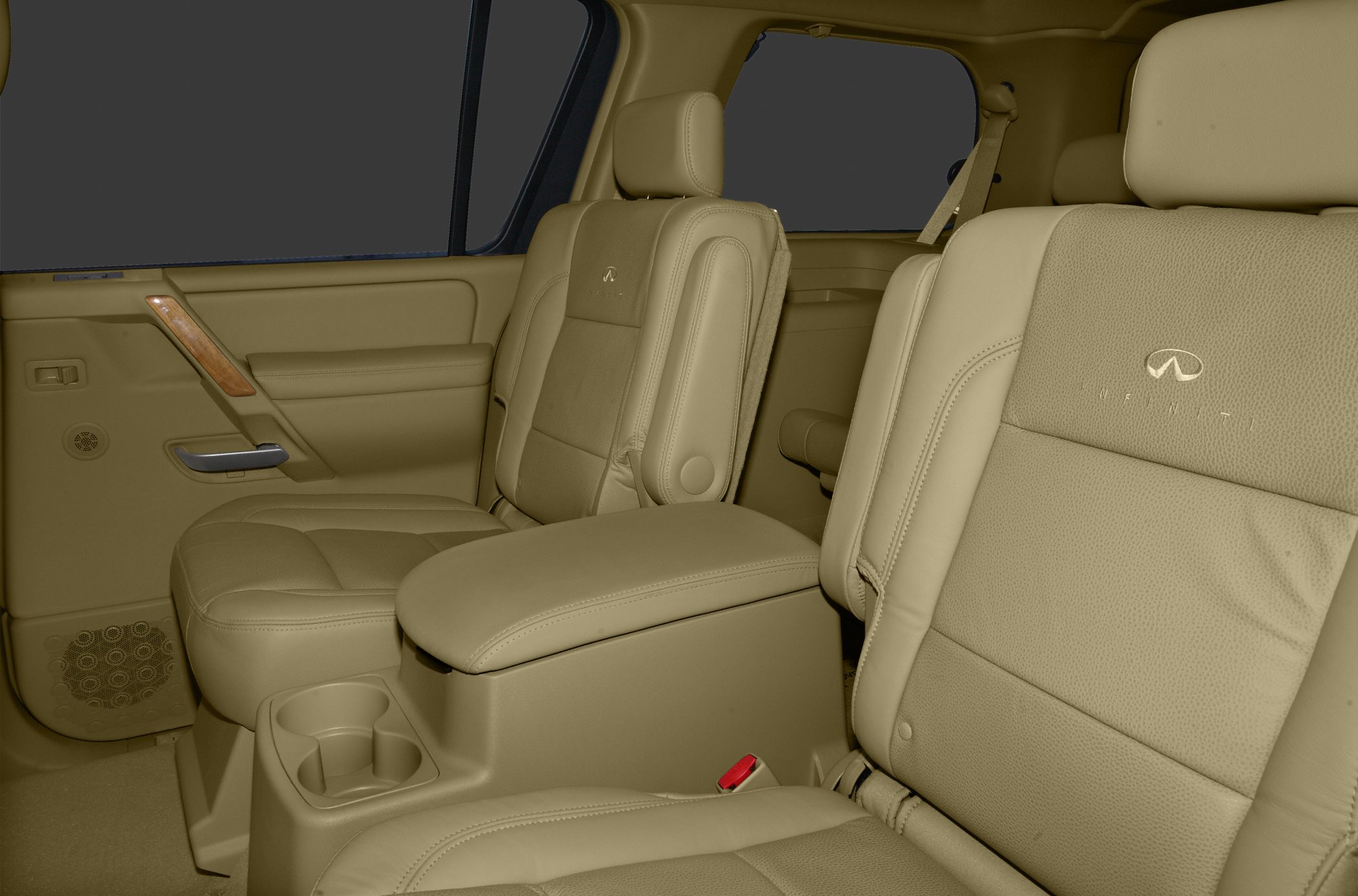Beige leather seats and armrest of luxury vehicle interior