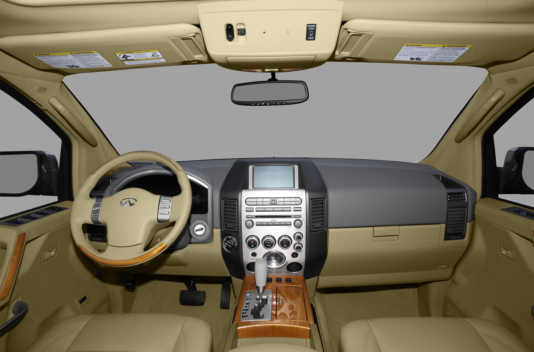 Wood-trimmed steering wheel and central control console with display