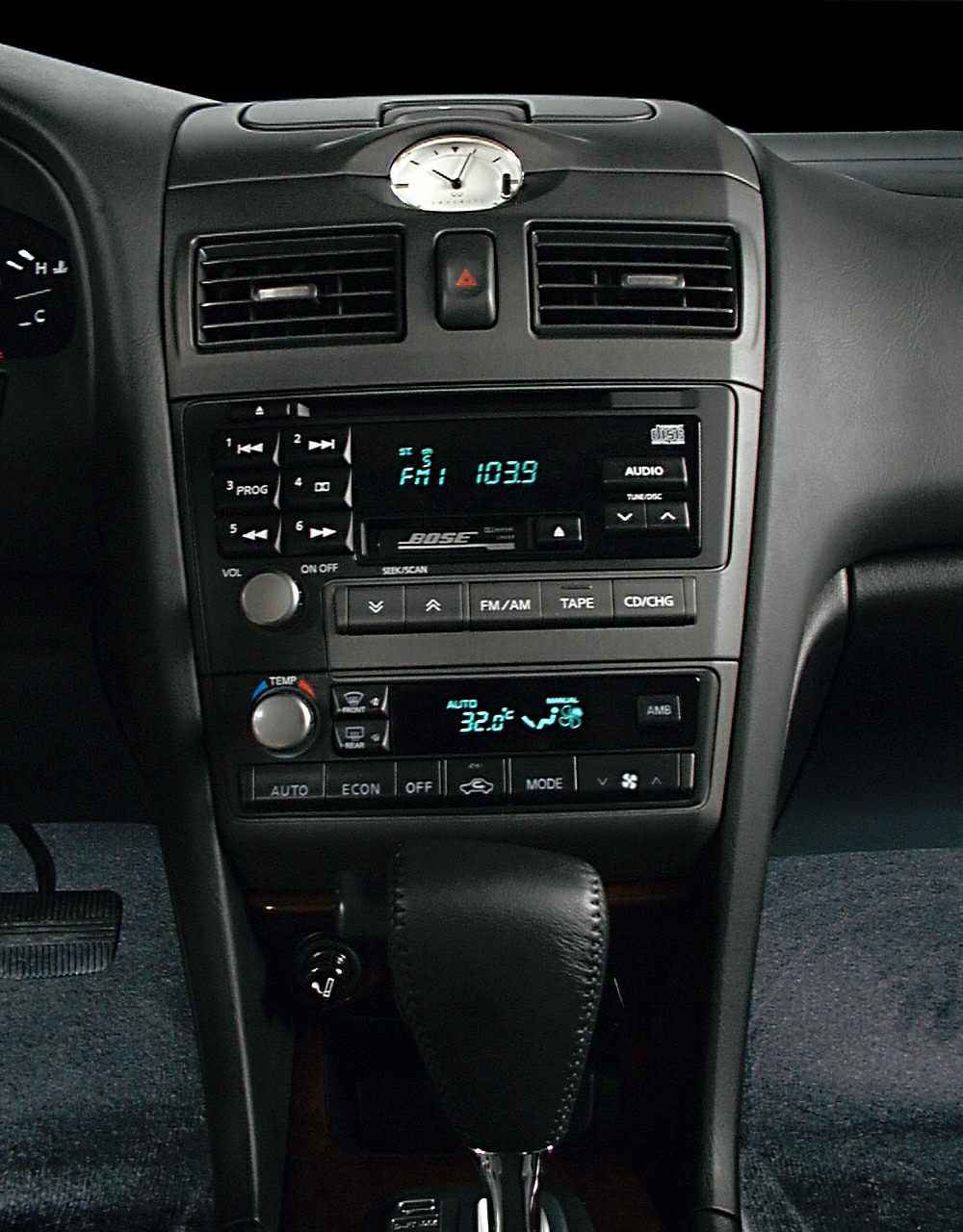 Center console with audio system, climate control, and gear shifter
