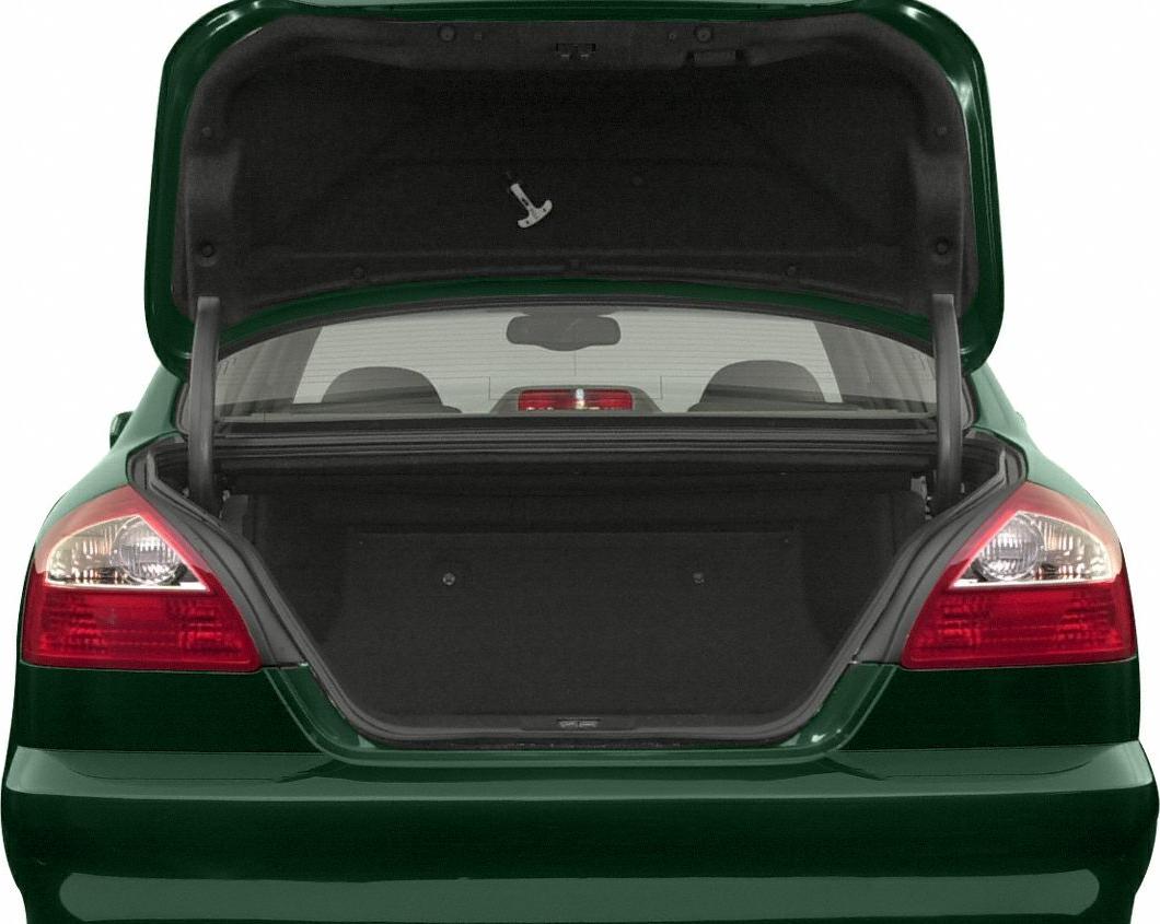 Open trunk and rear tail lights of a sedan