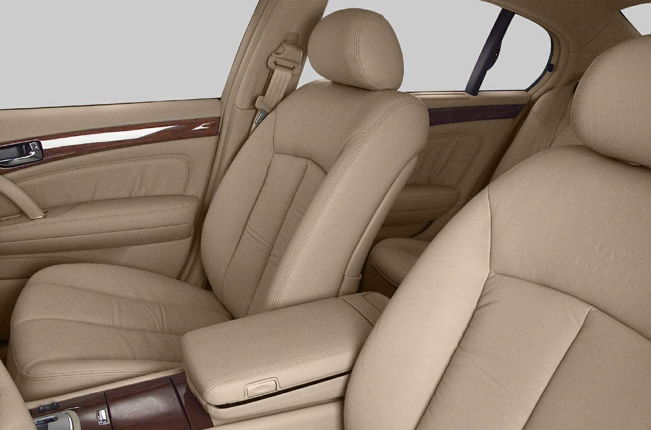 Beige leather seats with wood trim luxury interior