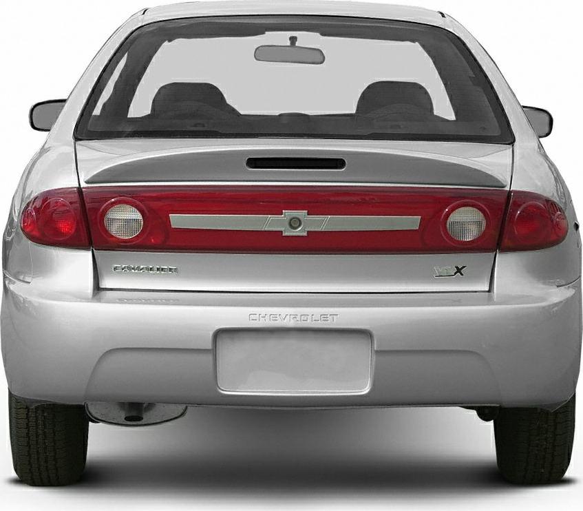 Rear view of a silver compact sedan with distinctive taillights and LX badge