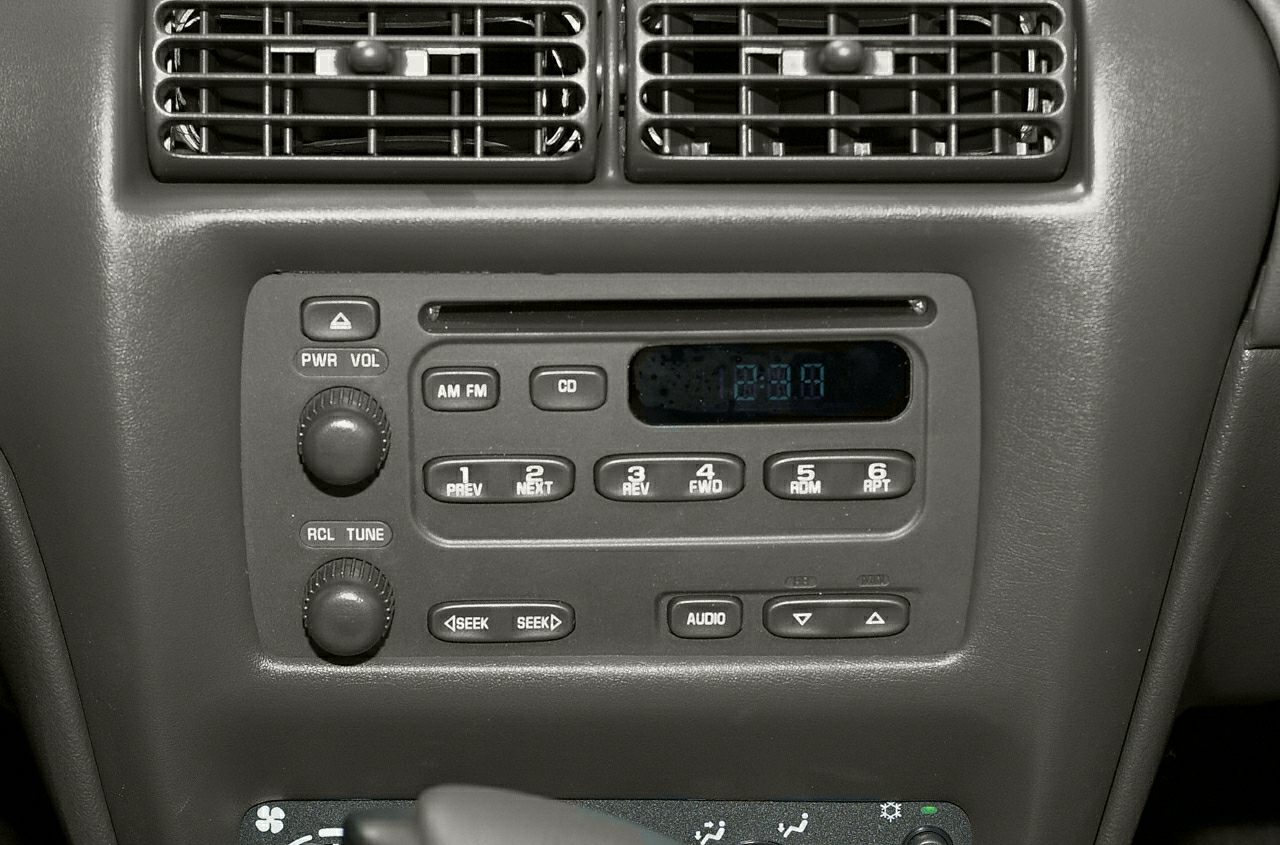 Dashboard radio and air vents with control knobs