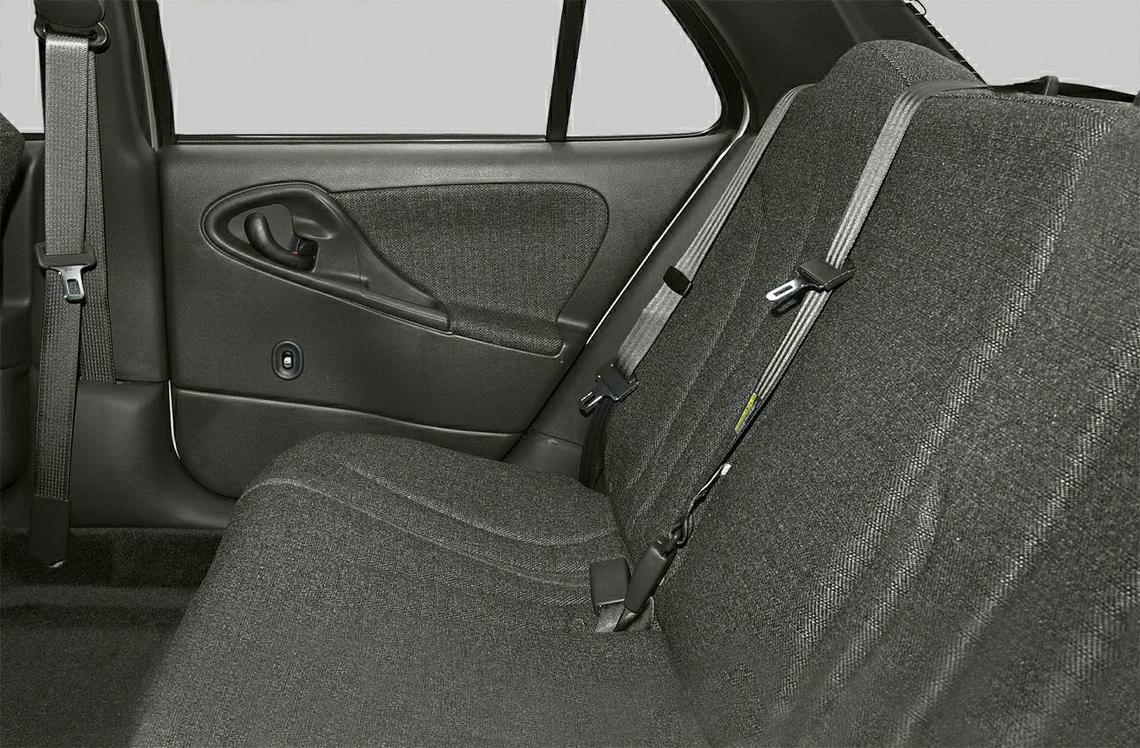 Rear seat interior with fabric upholstery and seat belts