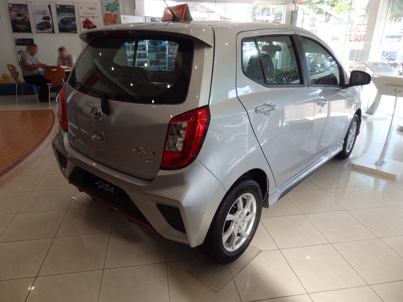 Rear and side view with taillights and alloy wheels
