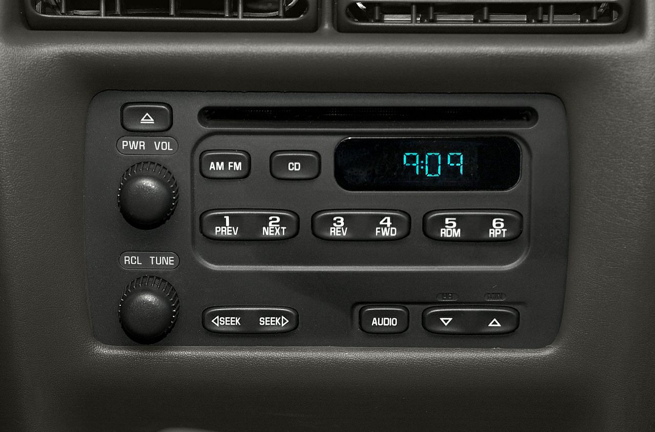 Radio console with digital clock and control buttons