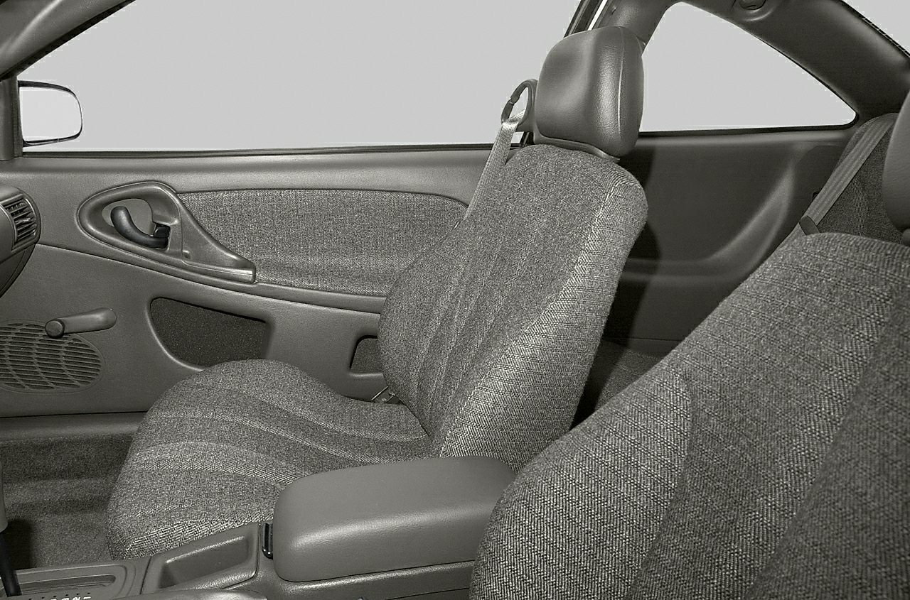 Gray fabric front seats and door panel with seatbelt and handle
