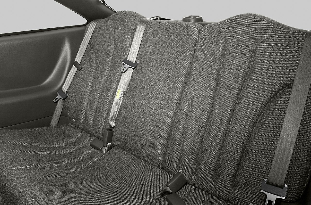 Fabric rear seat with seatbelts in a coupe interior