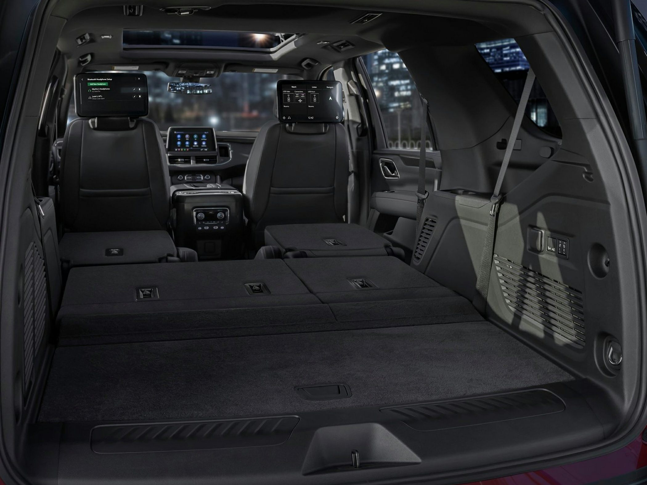 Spacious cargo area with fold-flat seats and dual rear entertainment screens