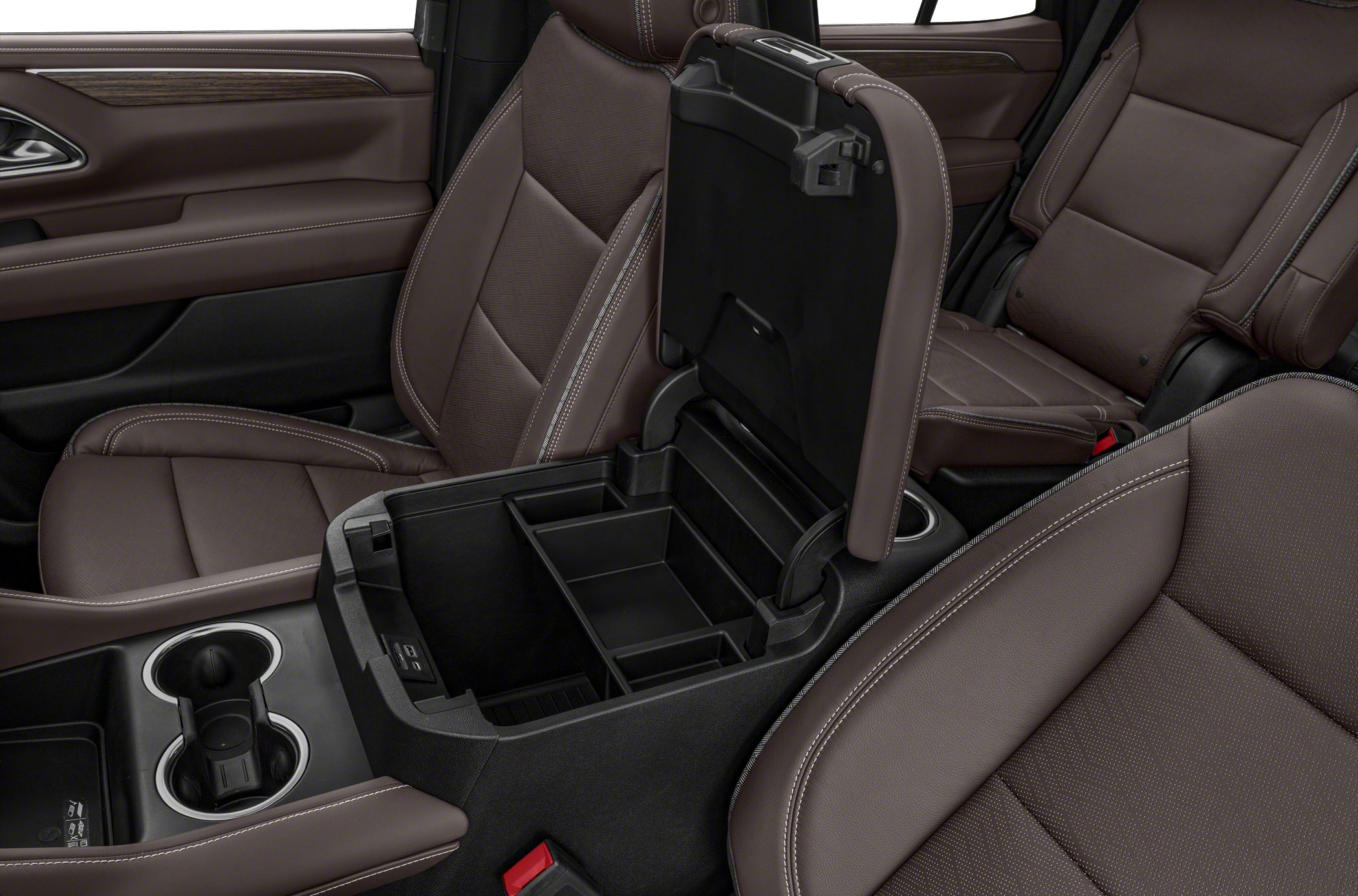 Spacious brown leather seats and center console storage compartment