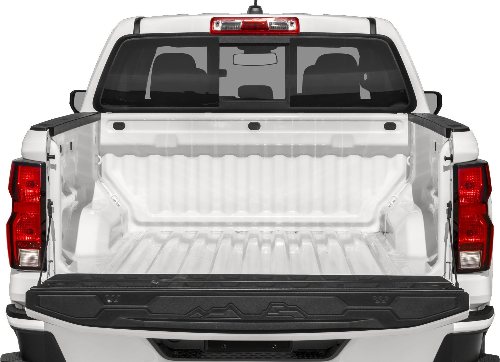 Spacious pickup truck cargo bed with open tailgate and crew cab rear window