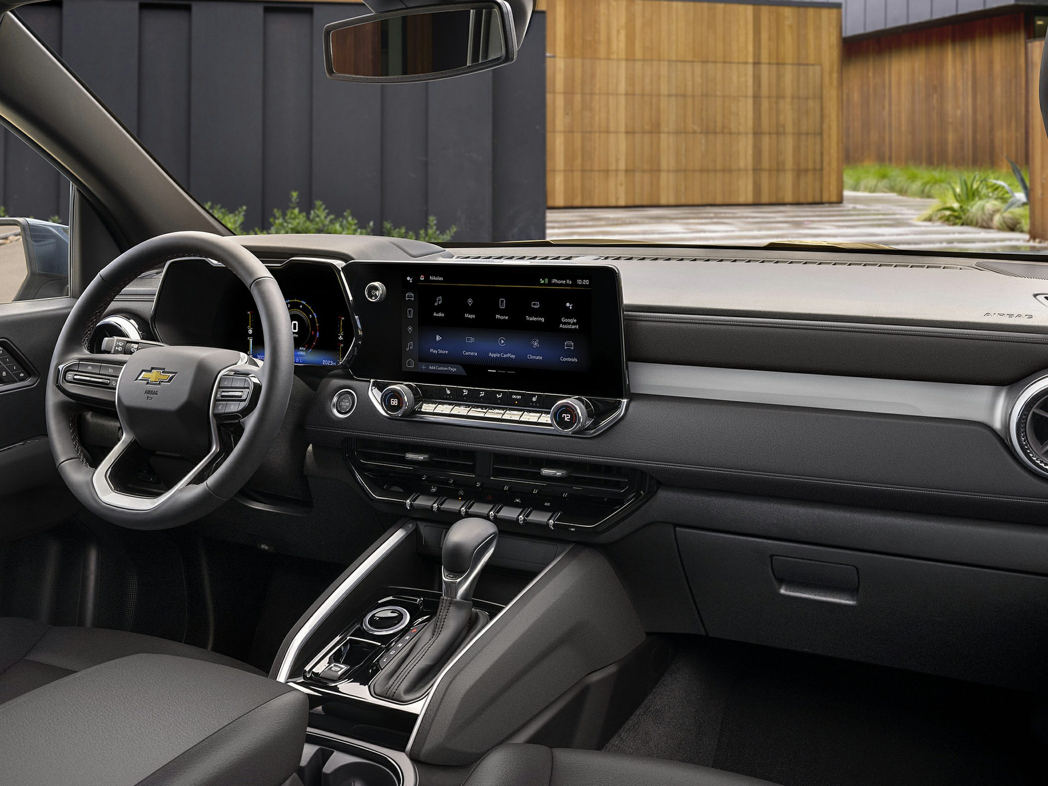 Modern truck interior with touchscreen dashboard and steering wheel controls