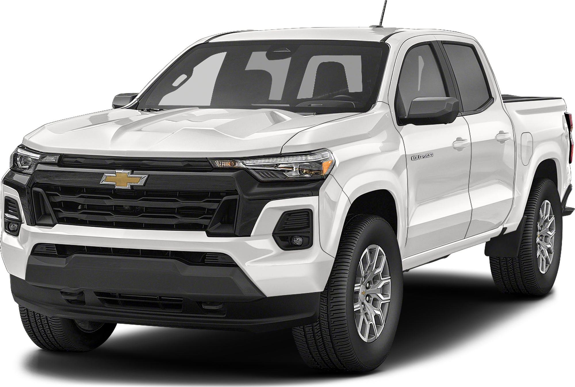 Front-side view of pickup truck with distinctive grille and alloy wheels