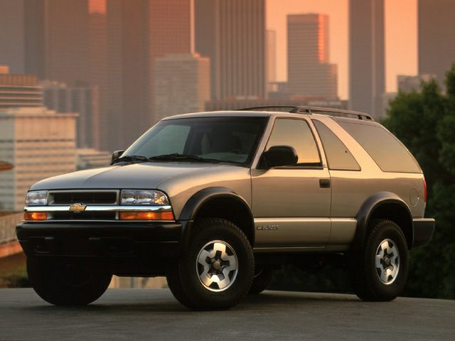 2-door SUV exterior showing front and side profile at sunset