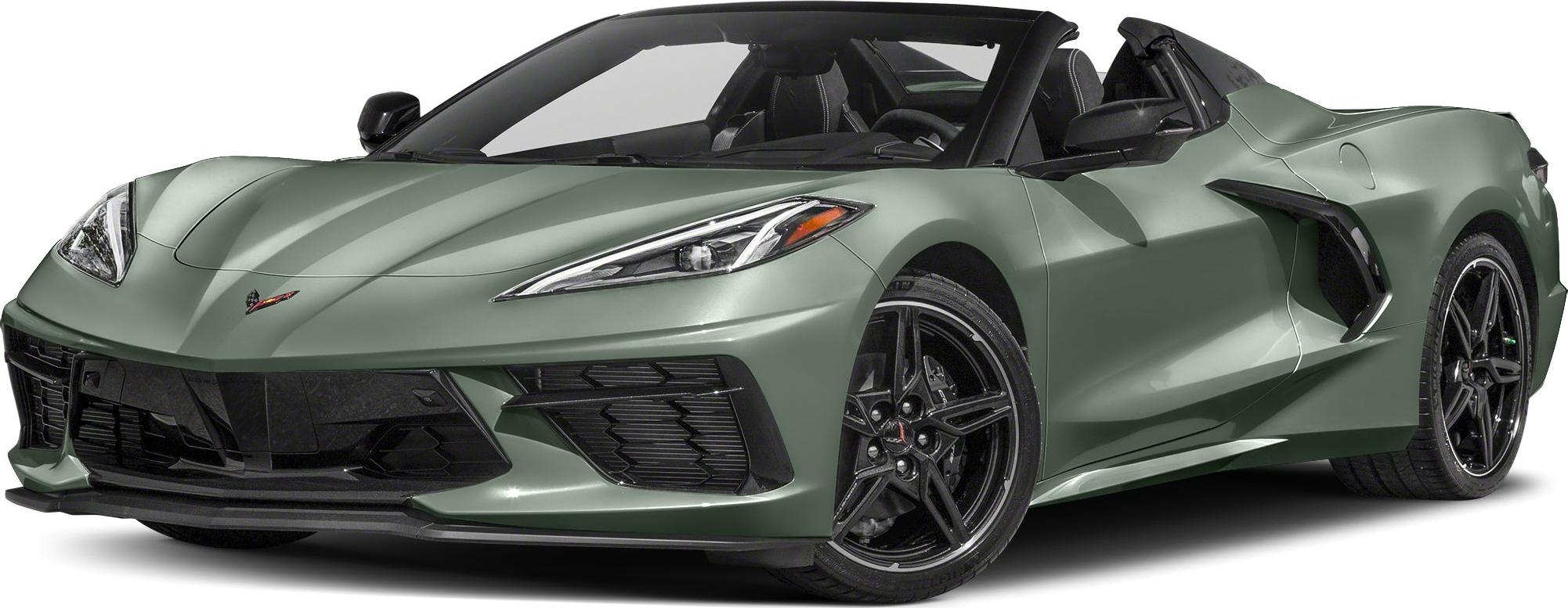 Front angle of a sleek convertible with sharp headlights and black alloy wheels