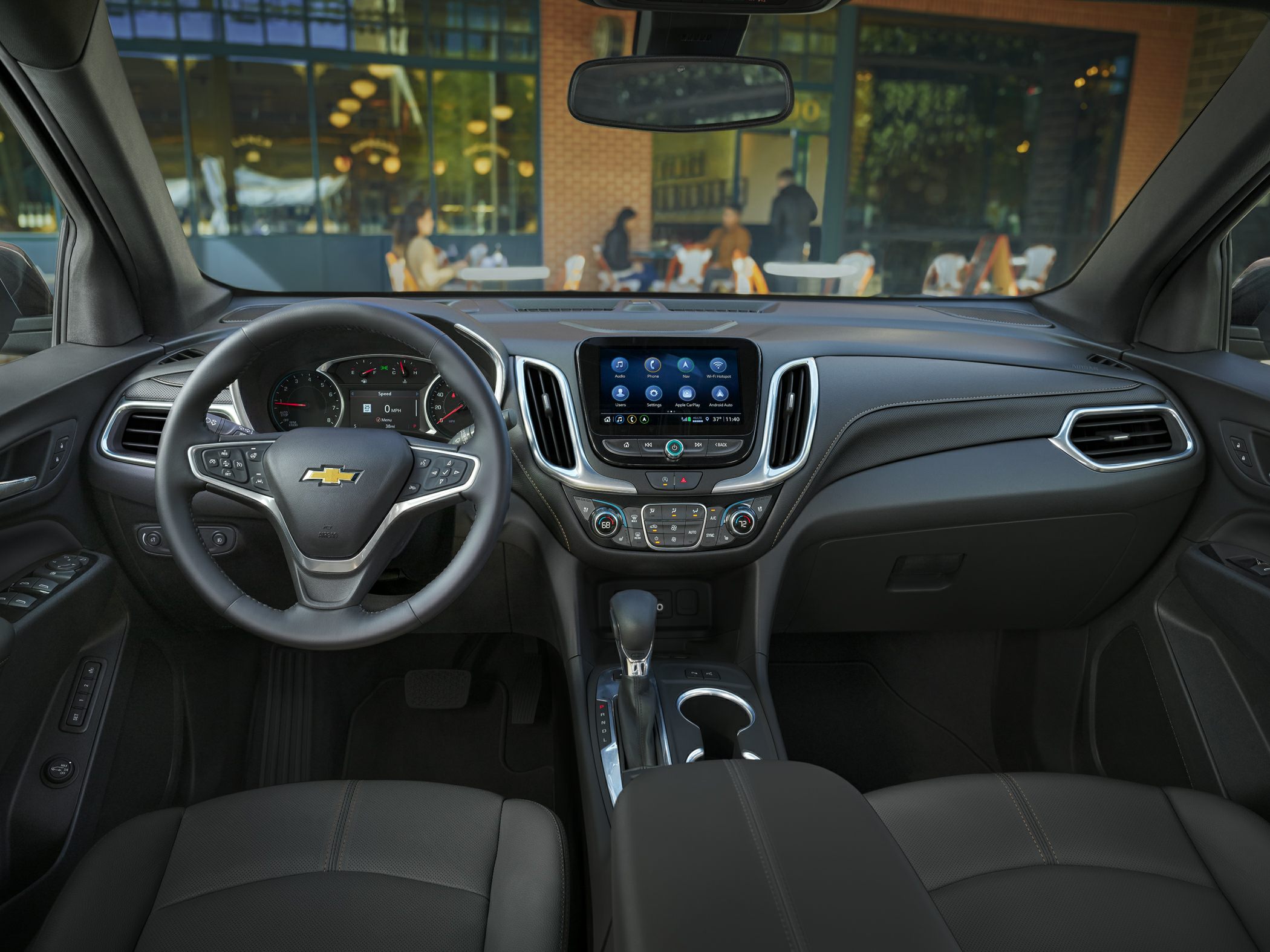 Dashboard and steering wheel with infotainment and climate controls