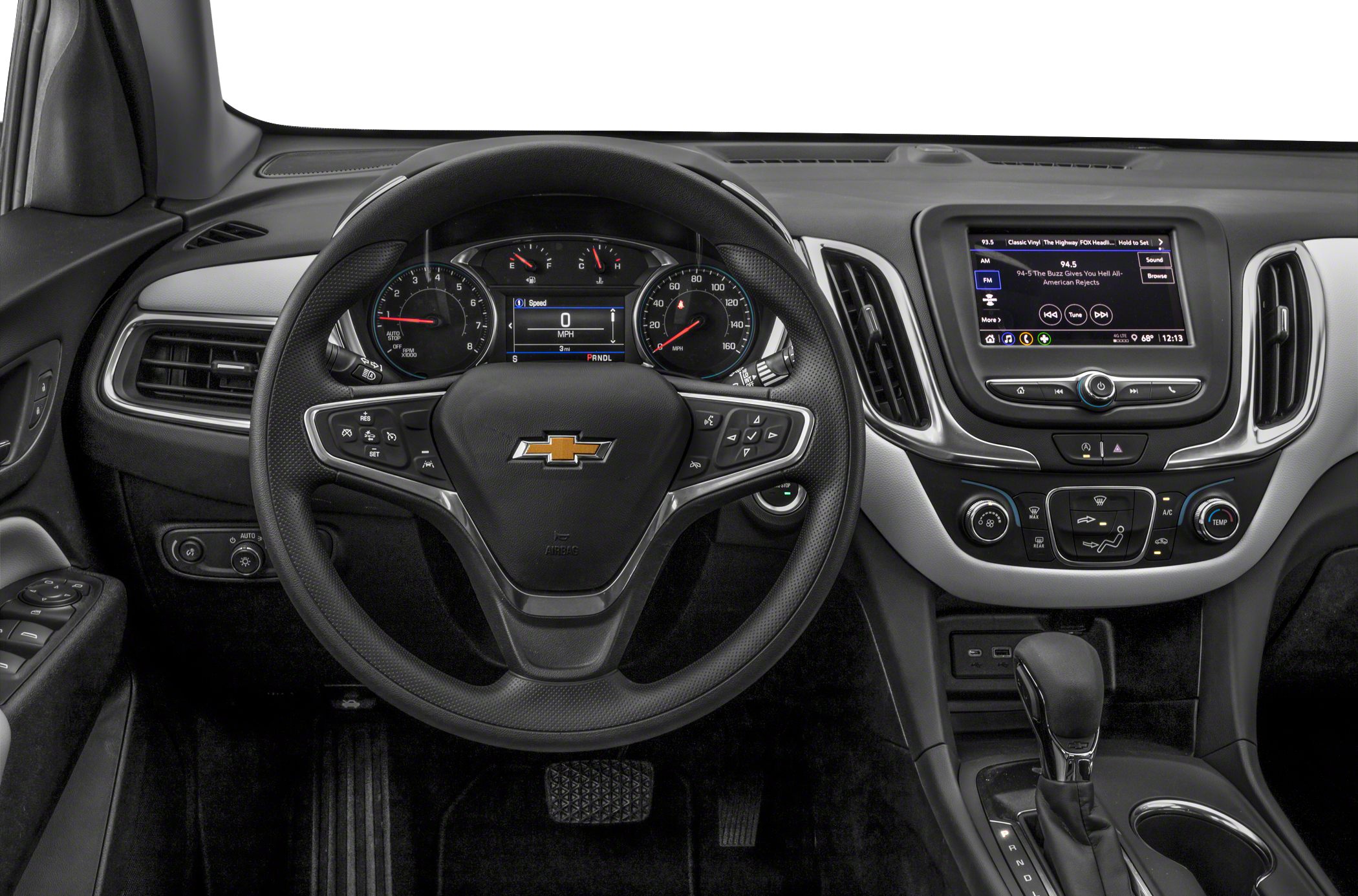 Steering wheel, digital instrument cluster, touchscreen infotainment, and climate controls