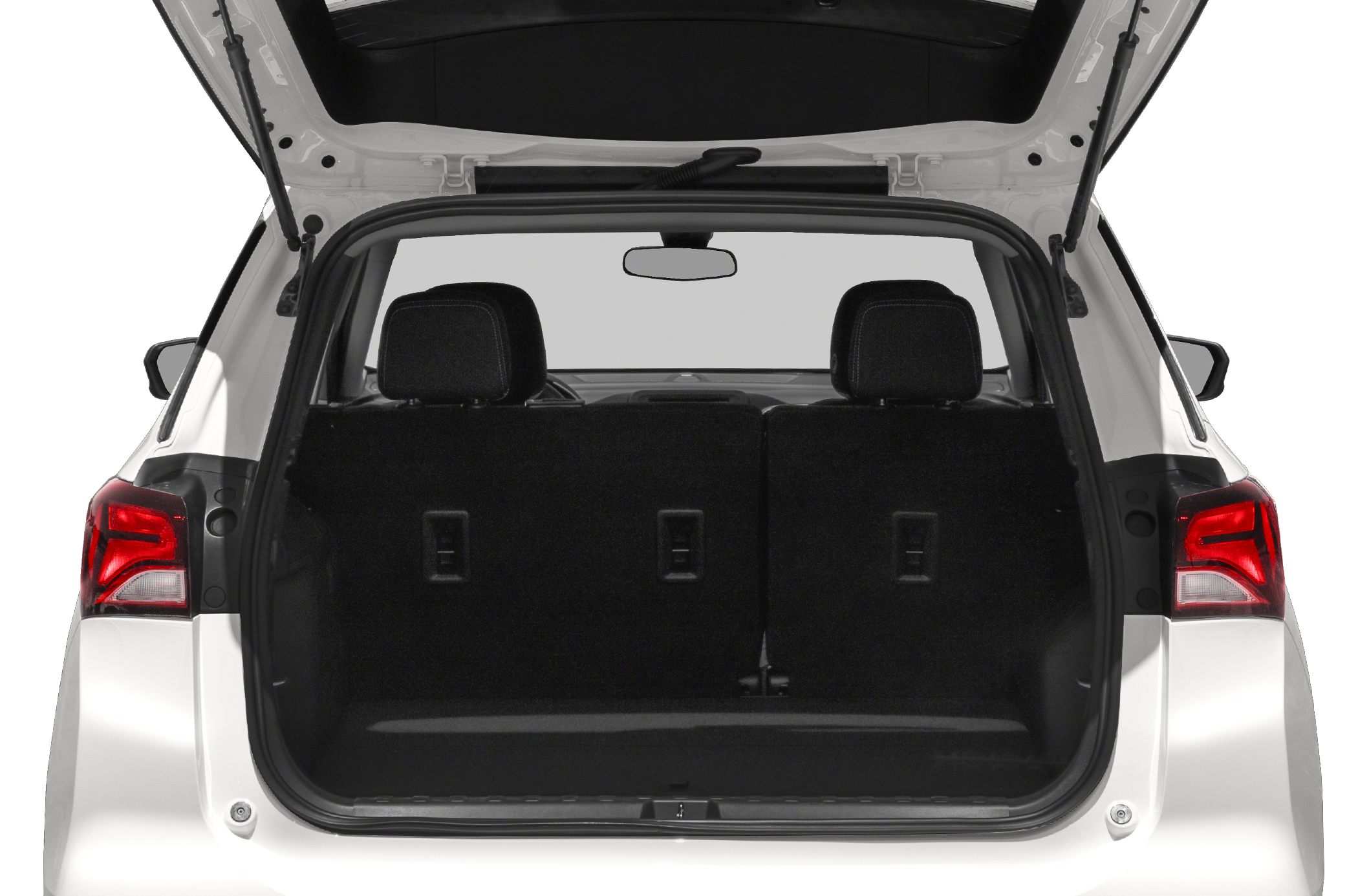 Rear cargo space and interior seating view of an SUV with open hatchback