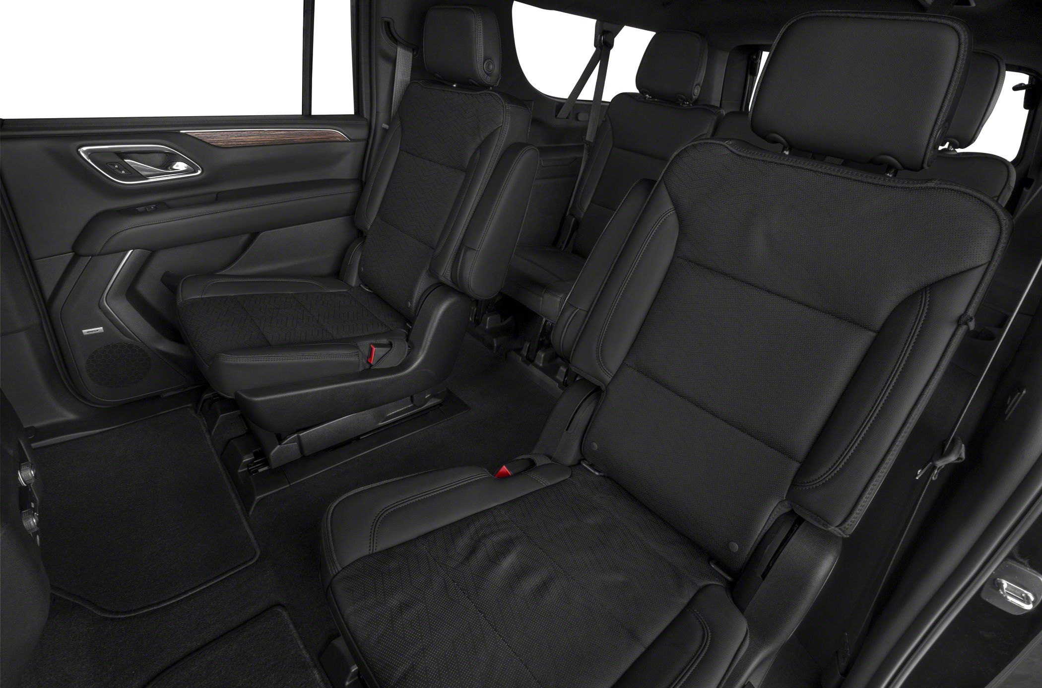 Spacious rear interior with black captain chairs and leather upholstery