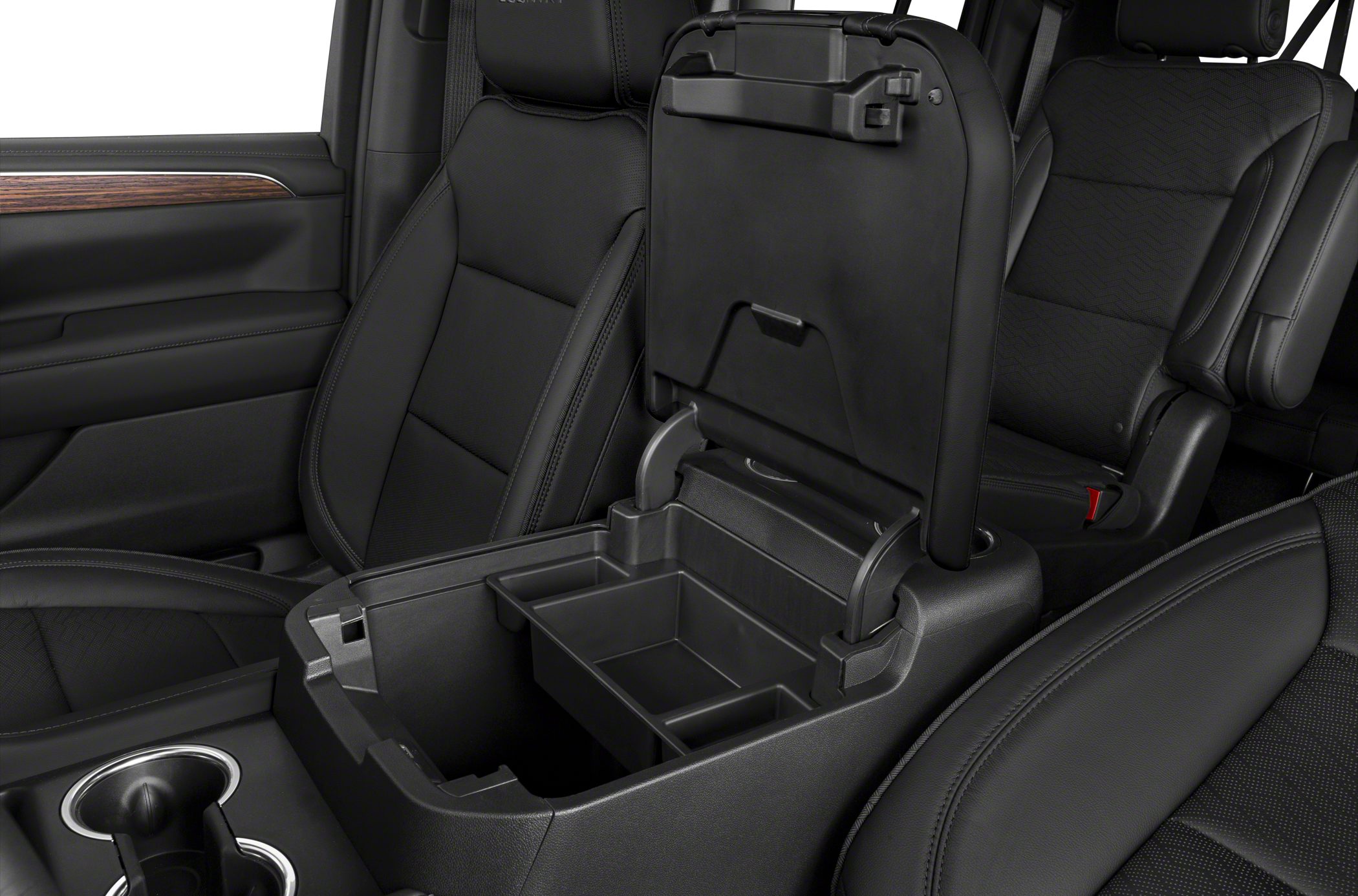Black leather seats with open center console and cup holders