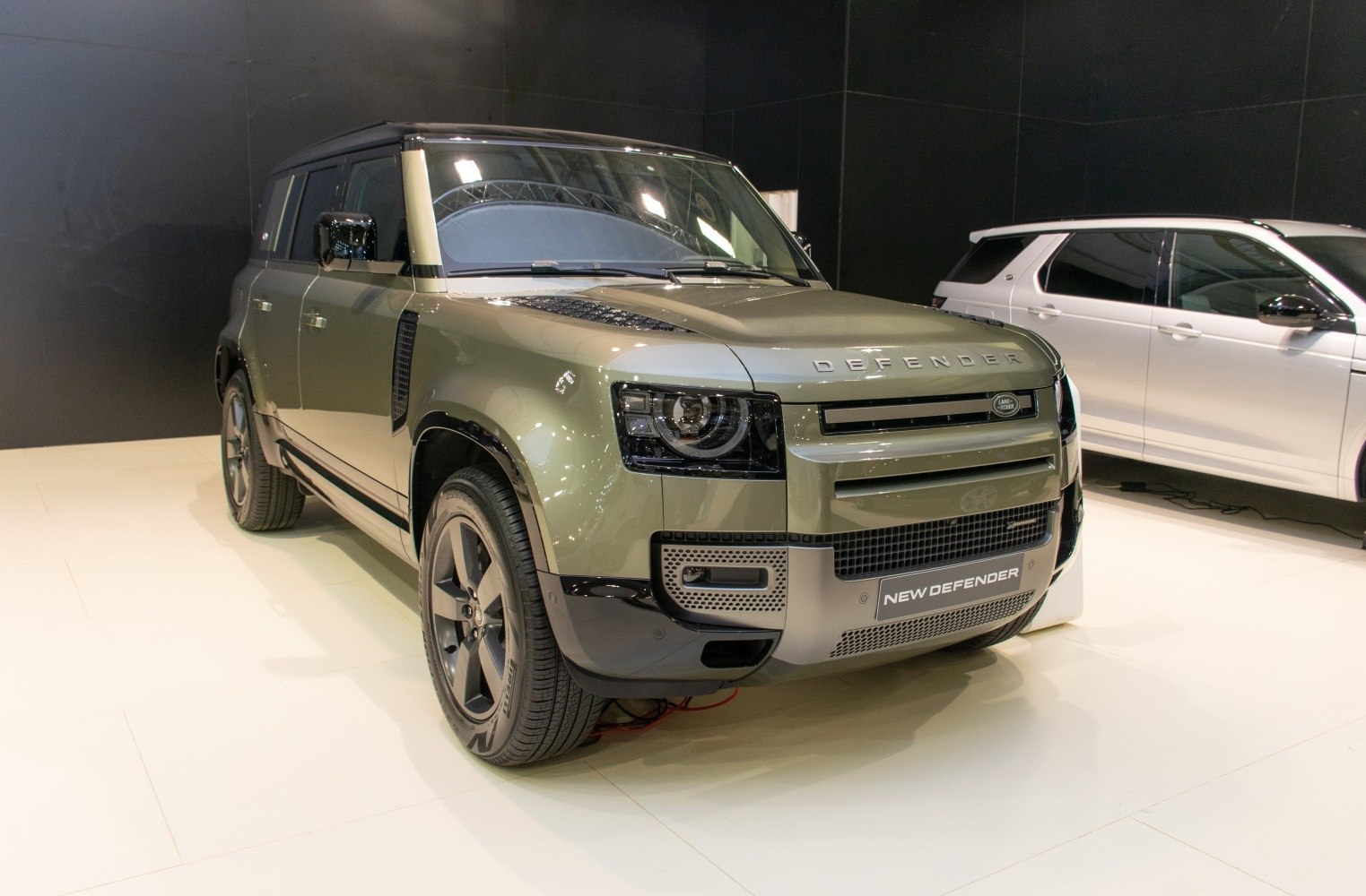 Front view showcasing bold headlights and robust grille design.