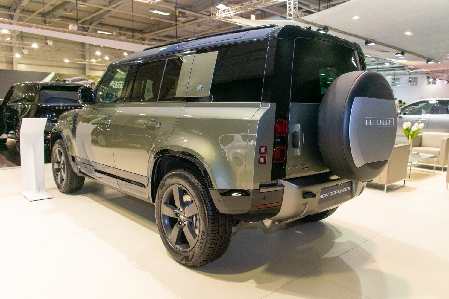 Rear and side profile with spare tire cover and alloy wheels
