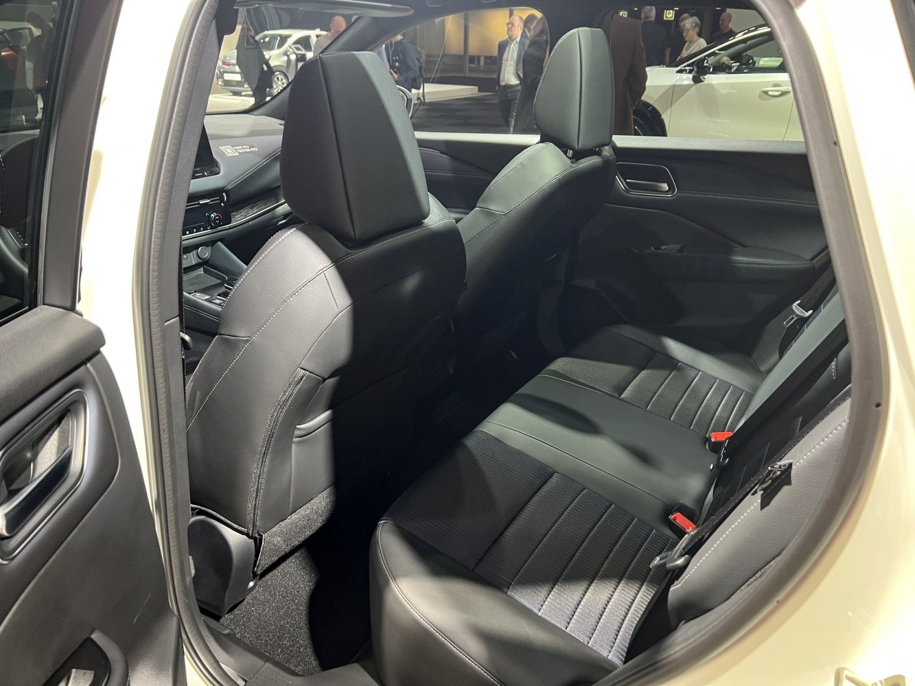Modern rear seating with leather upholstery and spacious legroom