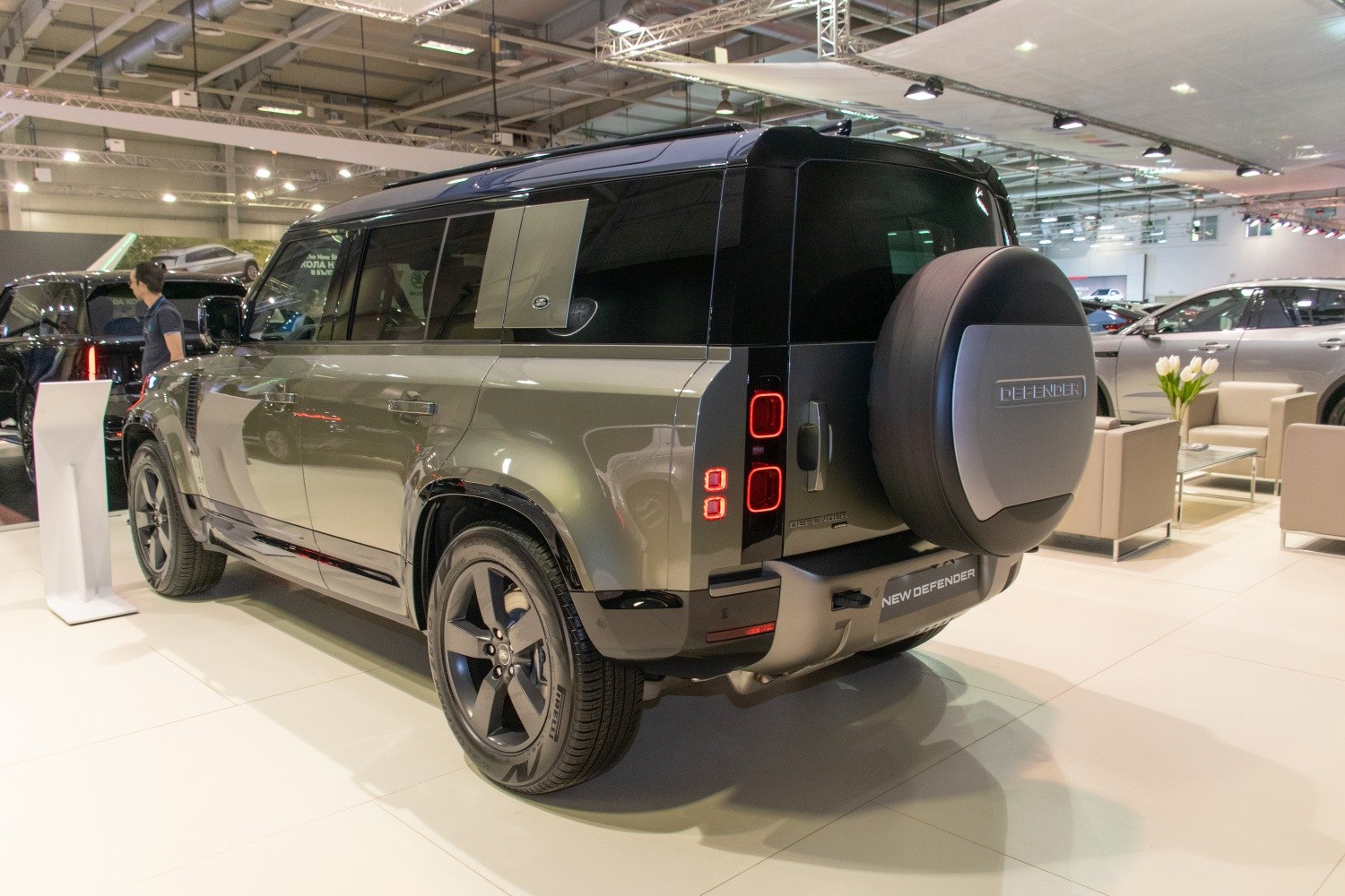 Rear view of SUV with spare wheel cover and taillights