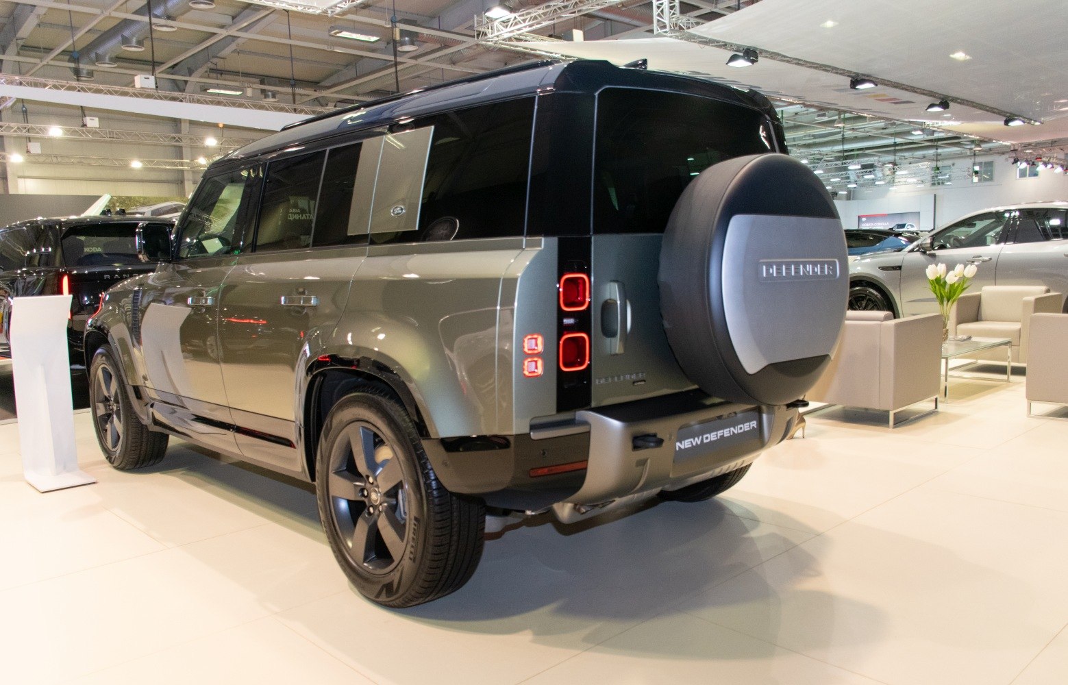 Rear side profile with spare tire cover and modern taillights