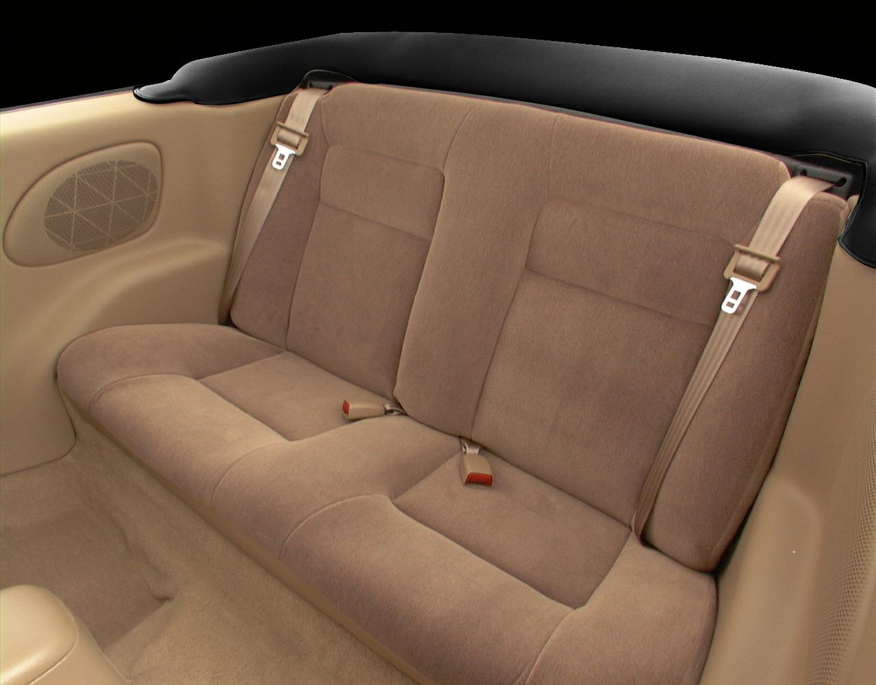 Rear seat interior with fabric upholstery and seatbelts in a convertible car