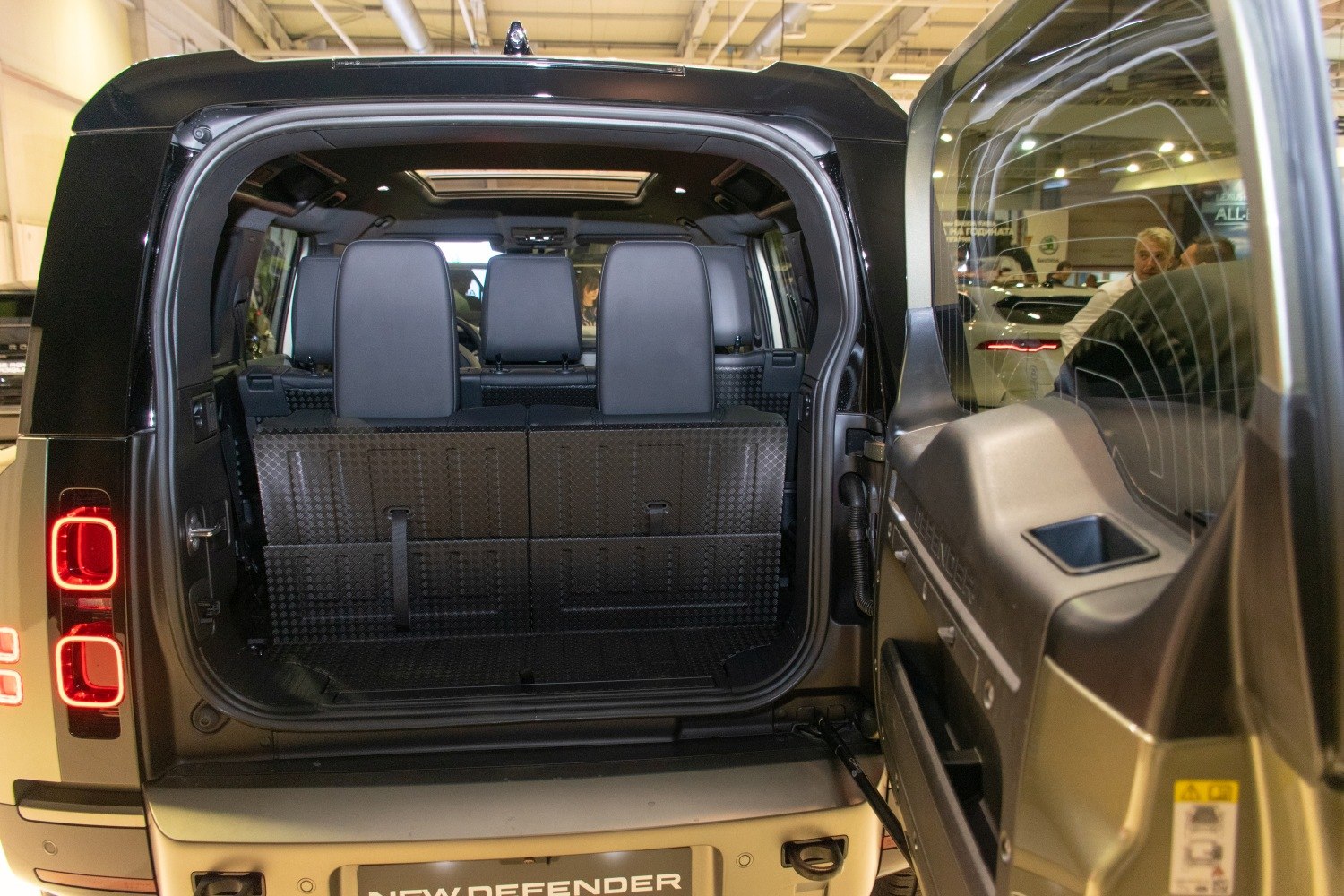 Open tailgate with rear cargo space and upright seats