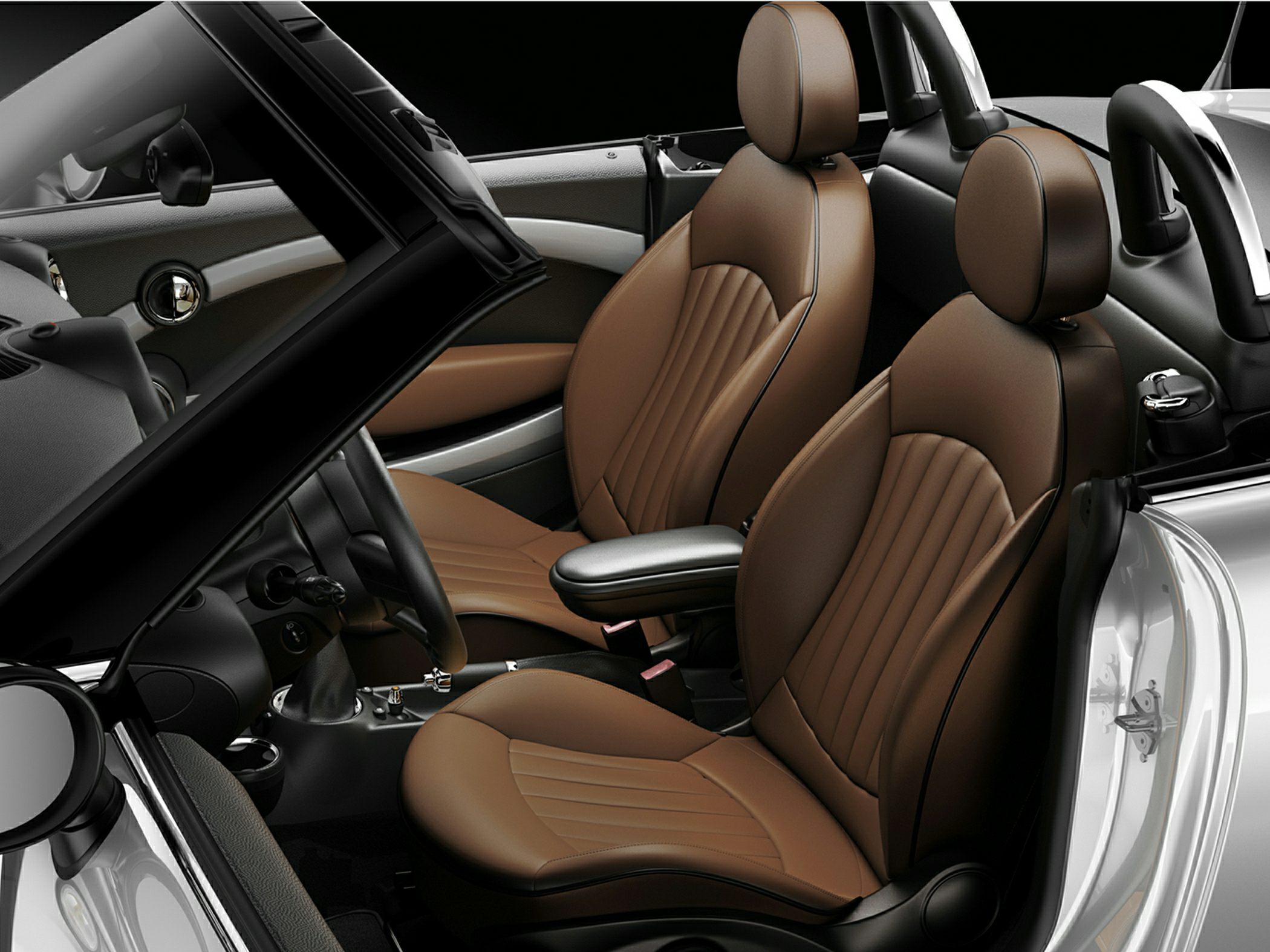 Brown leather two-seater sports car interior with convertible elements