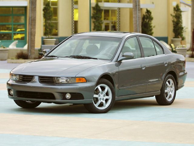 Front side view of four-door sedan with alloy wheels