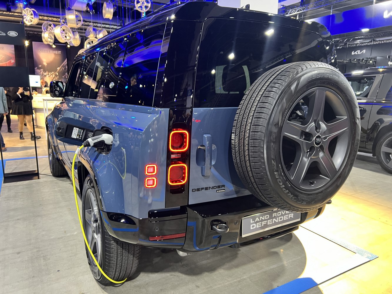 Rear view of SUV with electric charging and spare wheel