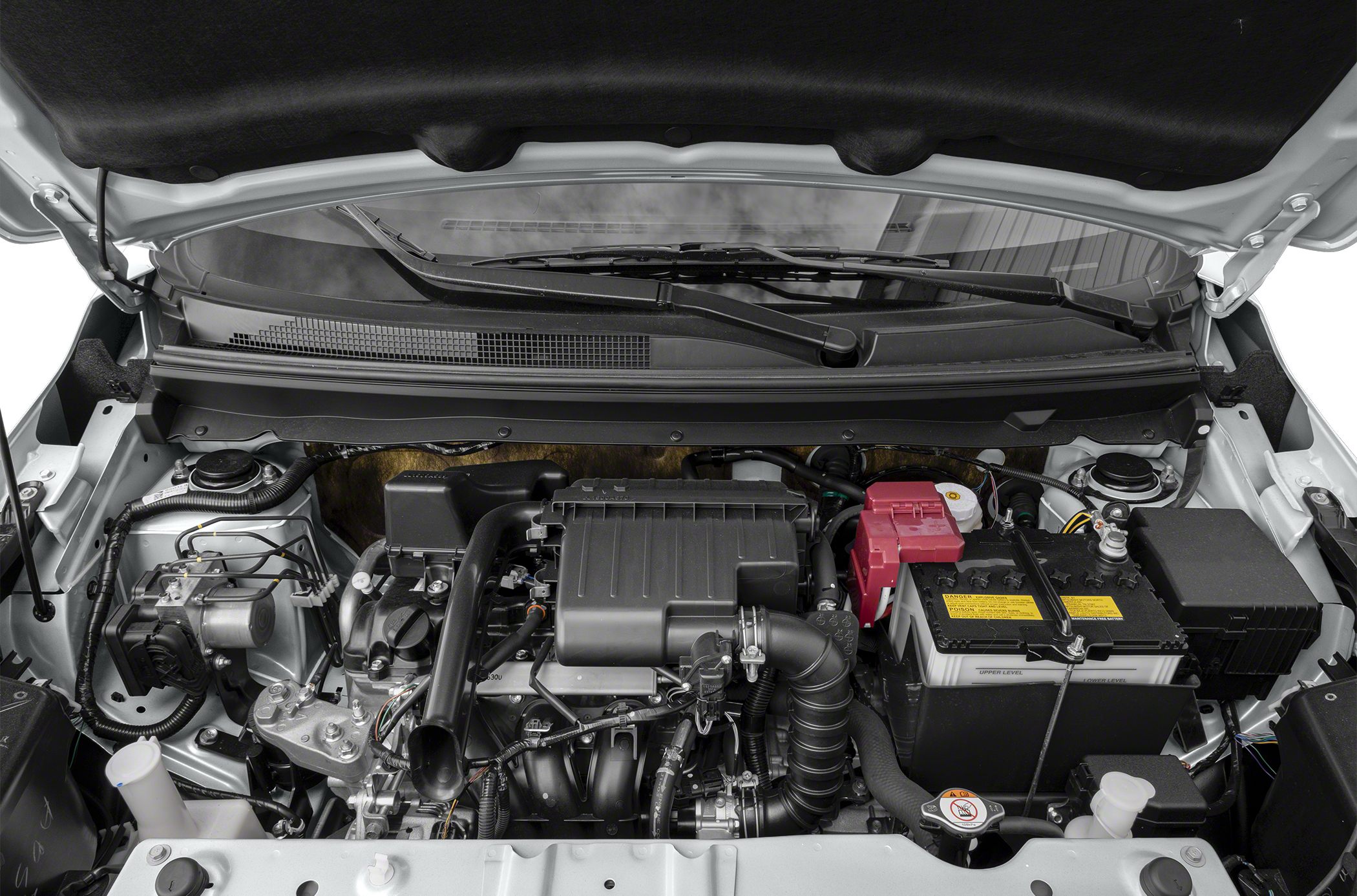 Compact engine bay with organized components and battery compartment